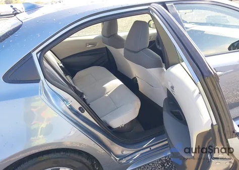 2021 Toyota Corolla Hybrid Le from USA, damaged, VIN JTDEAMDE0MJ003948